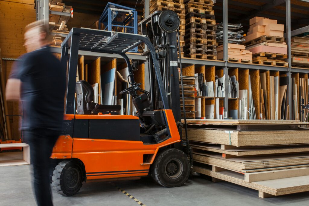 Carpentry Business moving lumber with a forklift