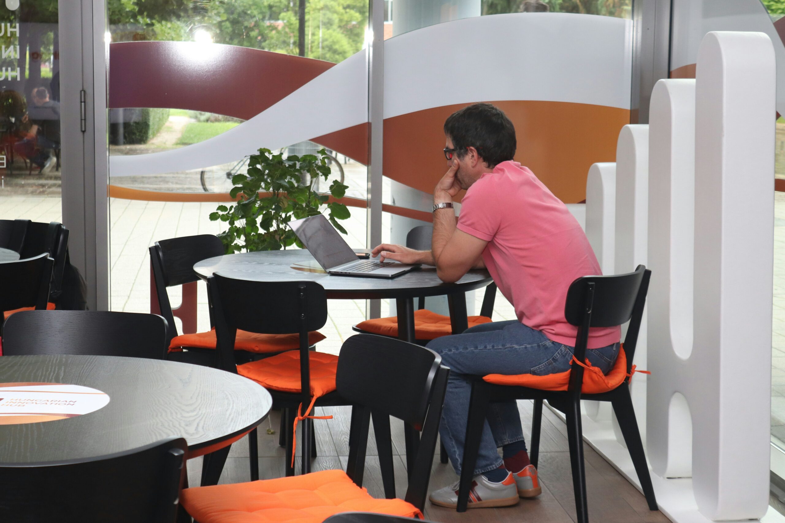 Man planning an event on his laptop