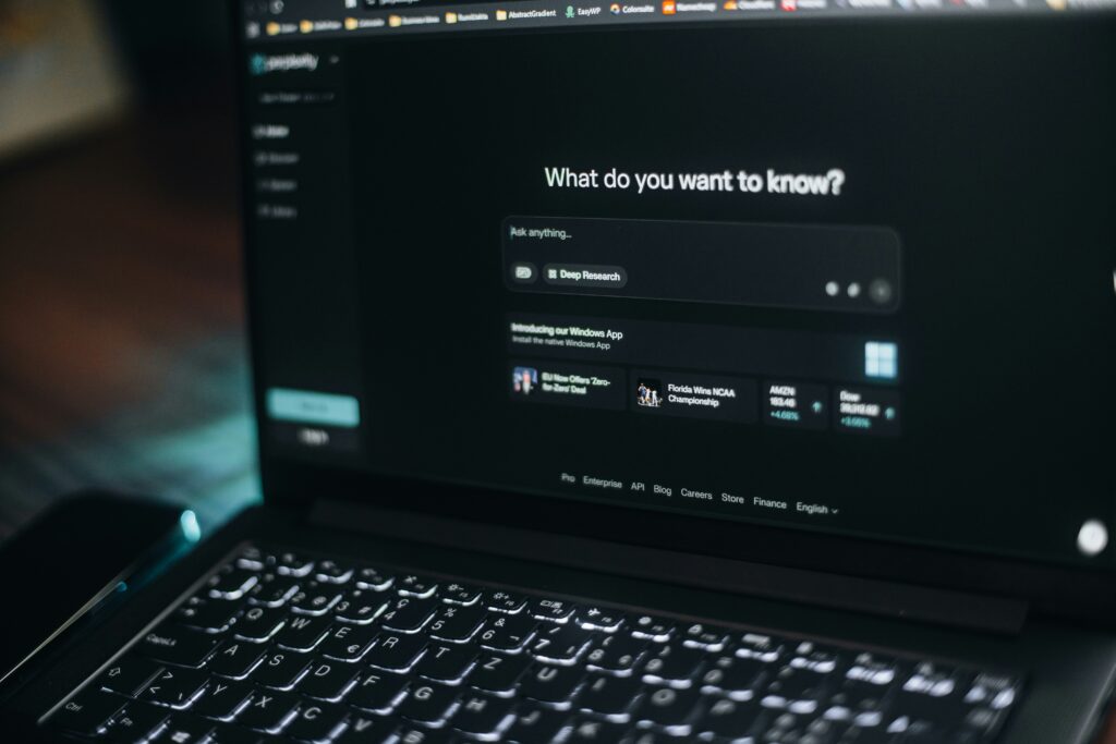 computer open on desk with ai open