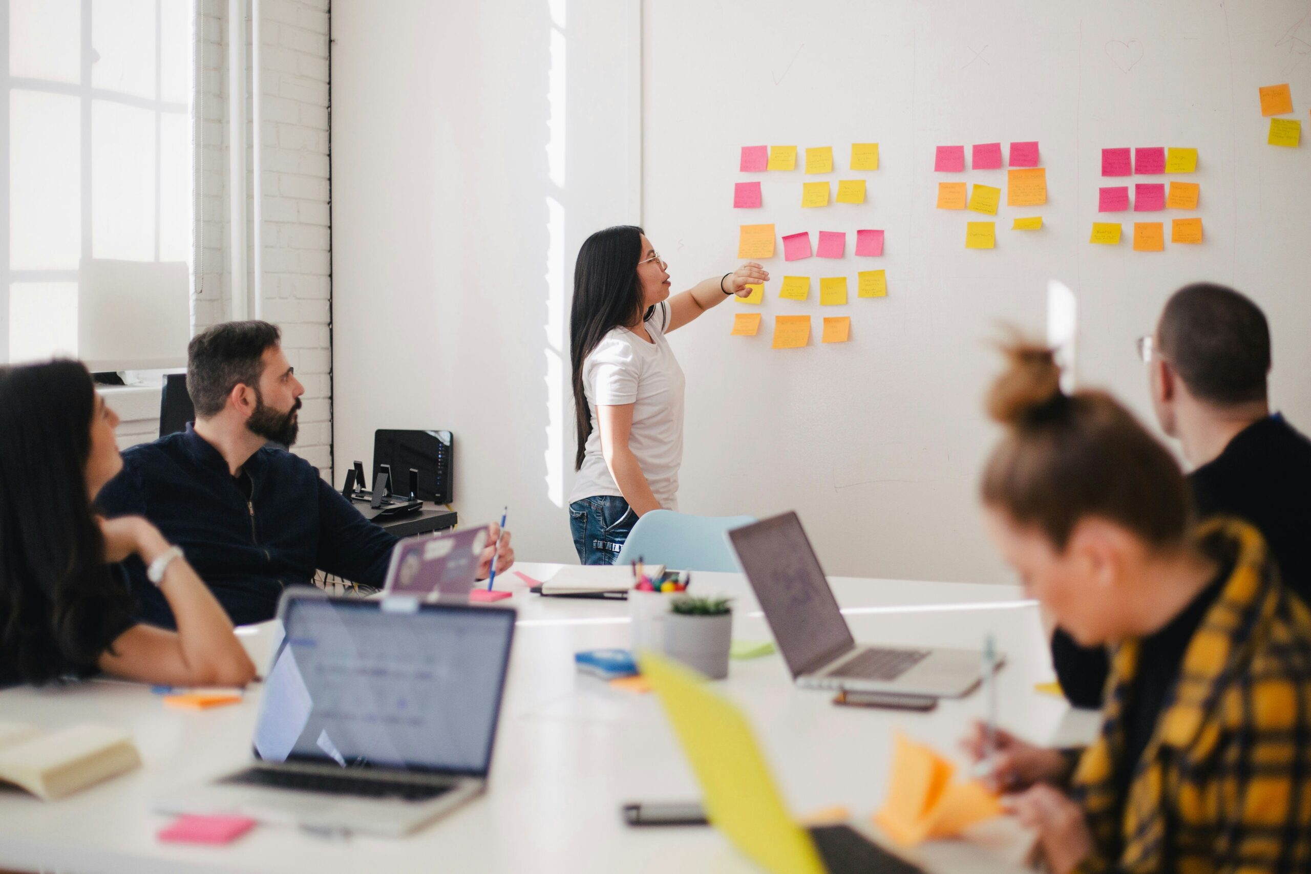 agency sitting at table in meeting