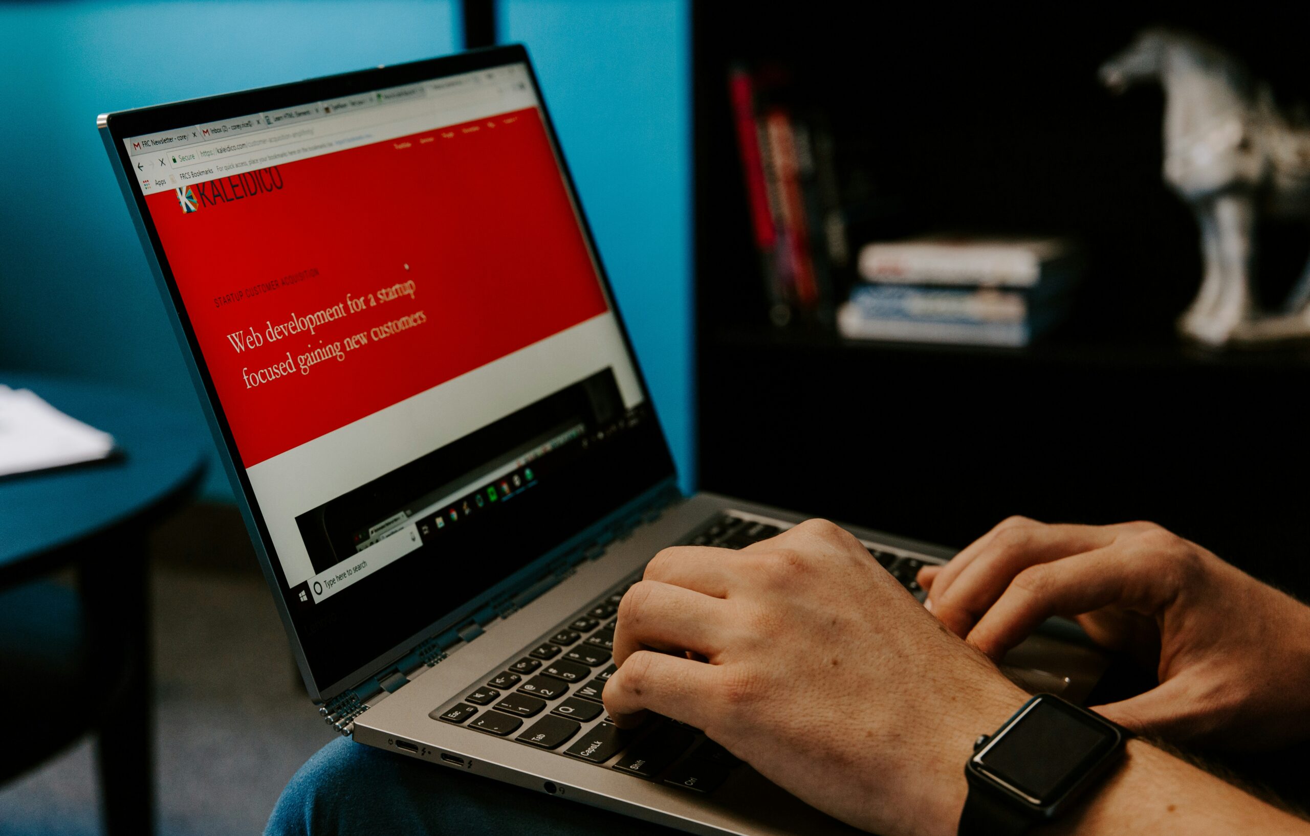 Man on a laptop on a website