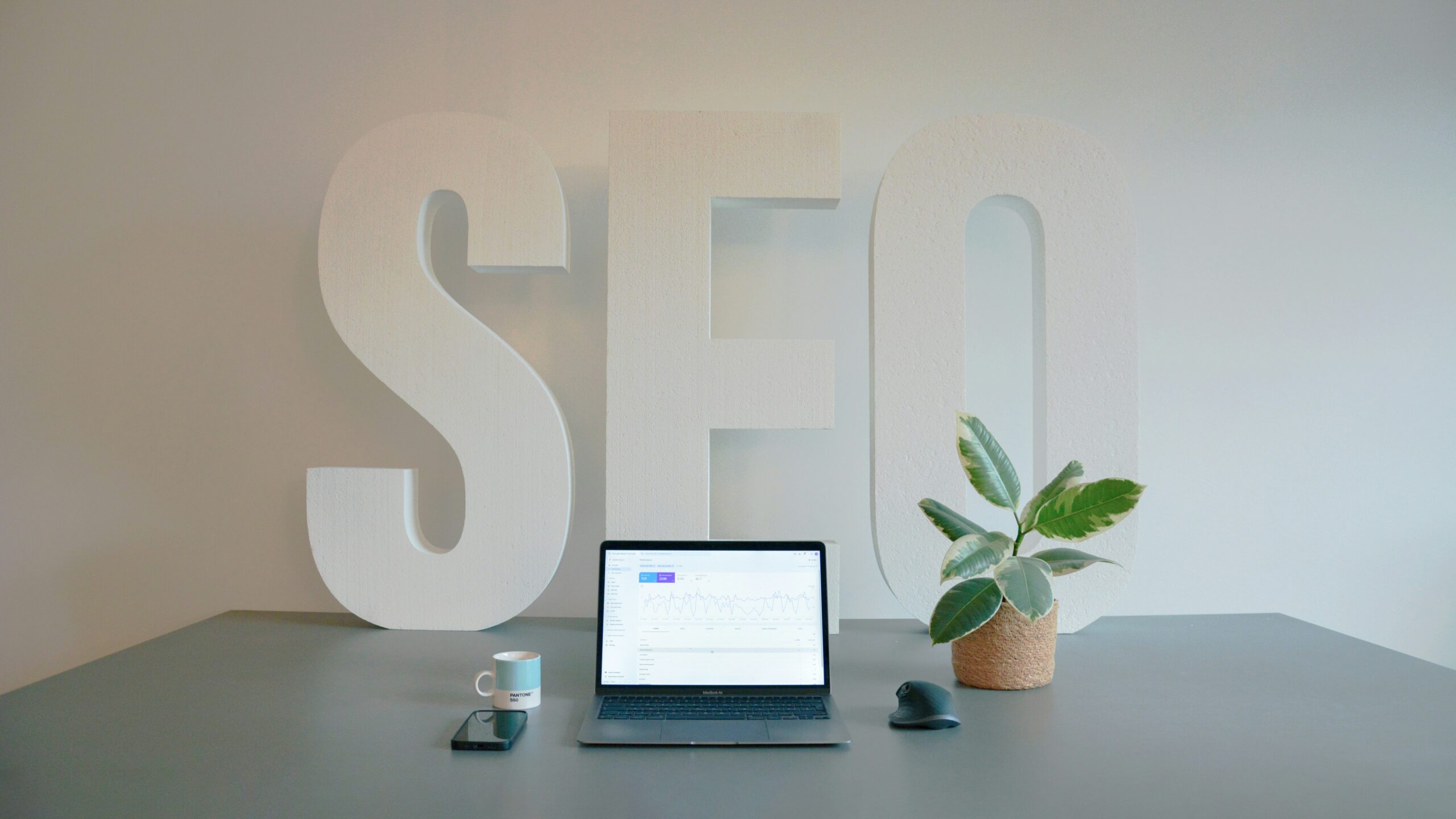 SEO Agency Connecticut sign behind a laptop on a desk