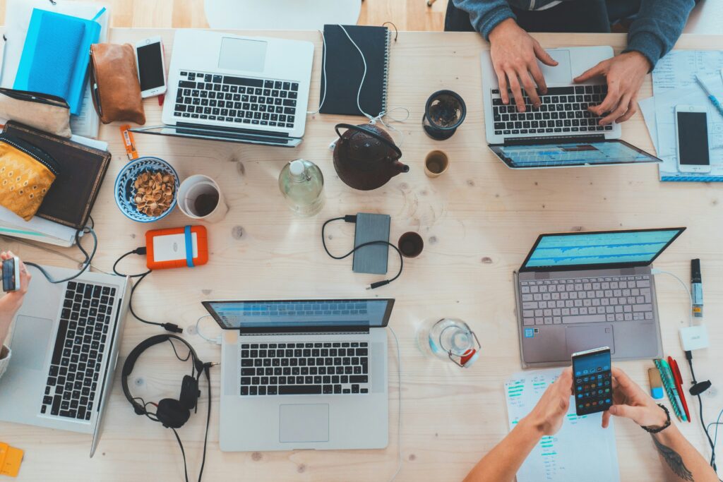 Digital Marketing crew working on laptops on desk