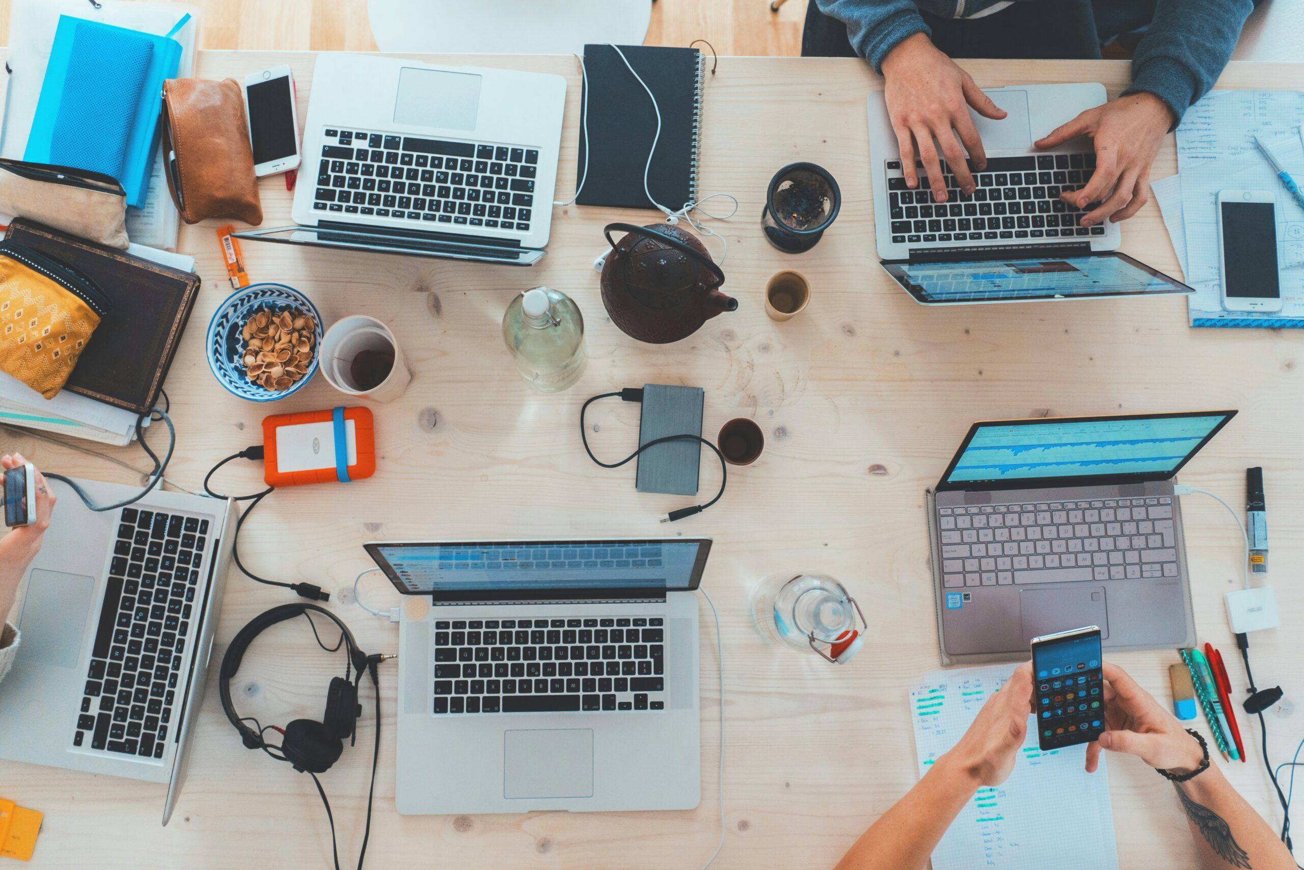 Digital Marketing crew working on laptops on desk