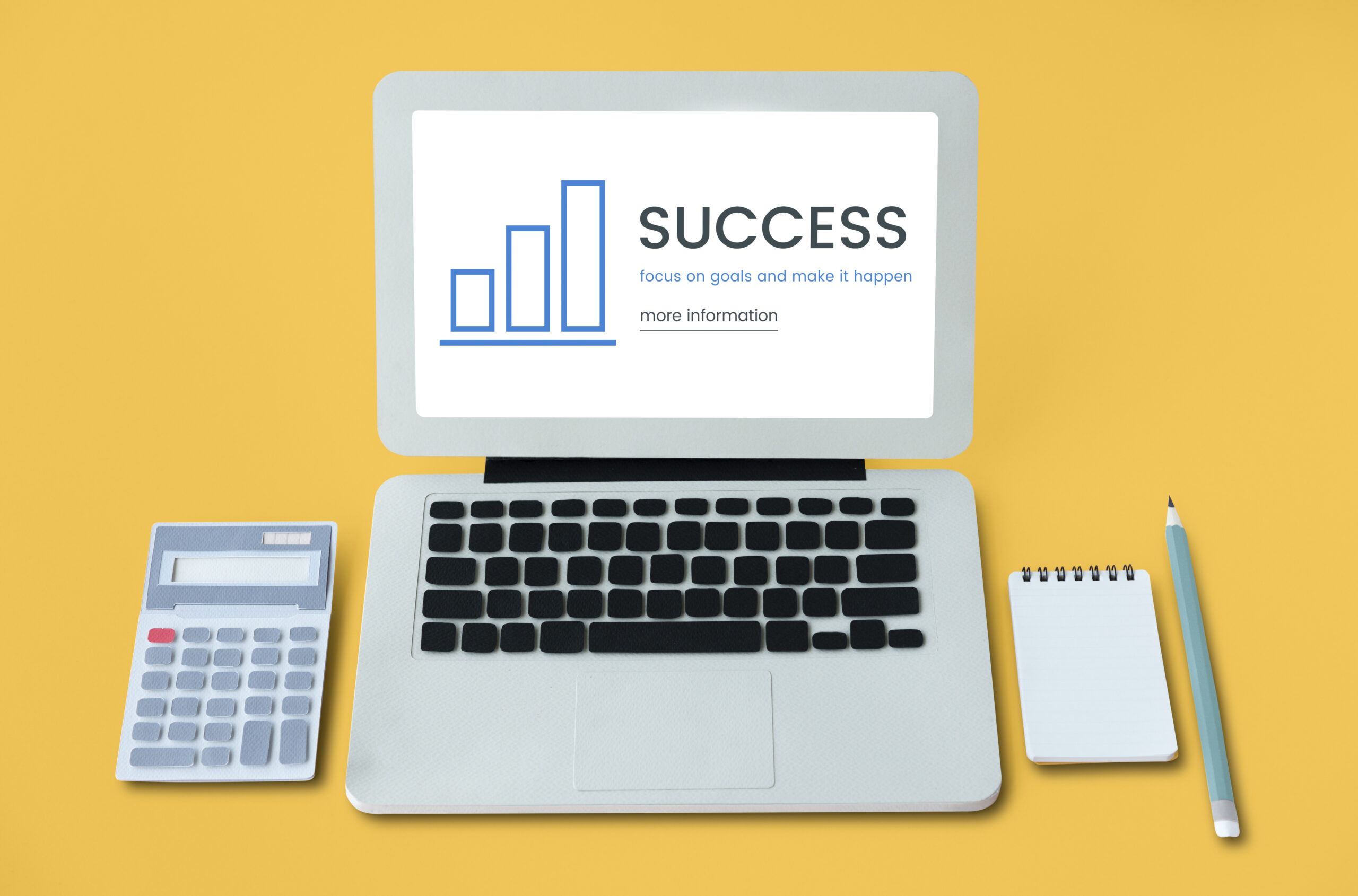 Computer saying success and making goals happen