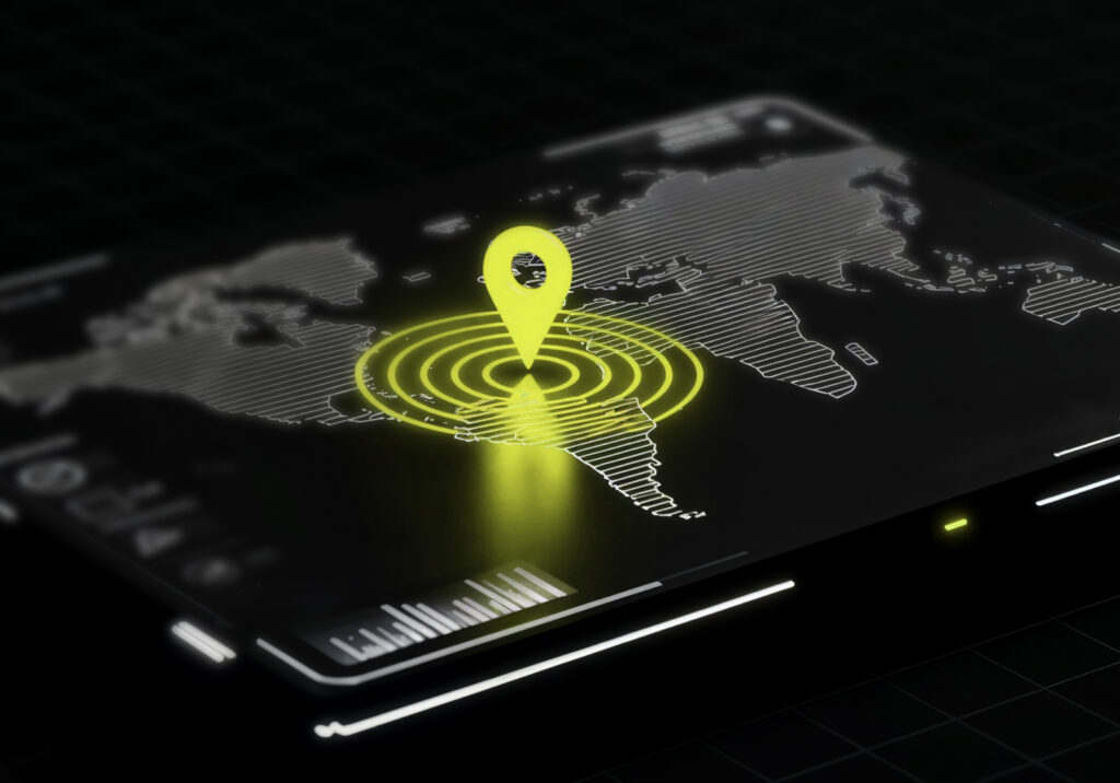 “Digital world map displayed on a smartphone screen with a glowing location pin highlighting a global target point”