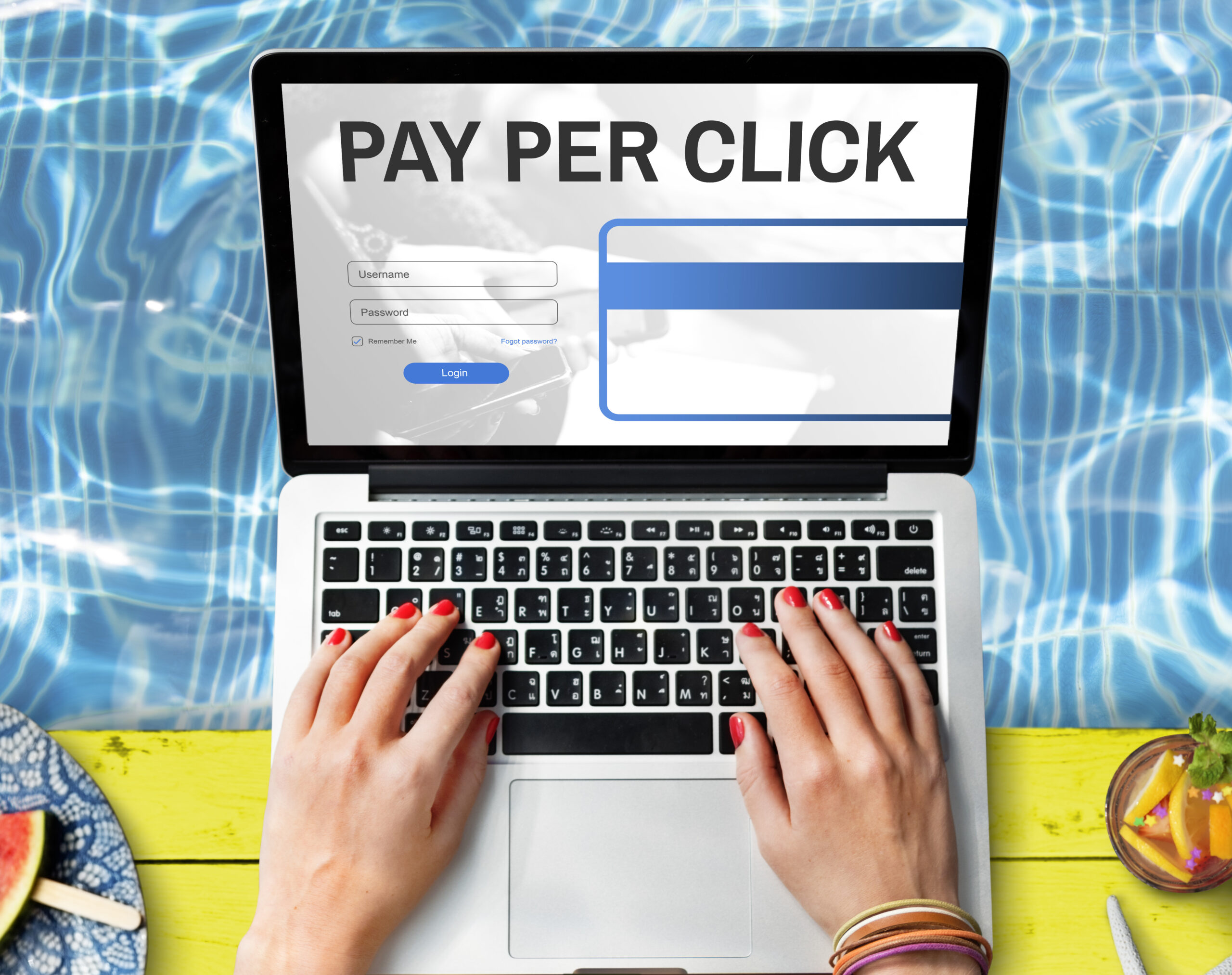 Person typing on a laptop displaying “Pay Per Click,” representing PPC digital advertising and online marketing campaigns.