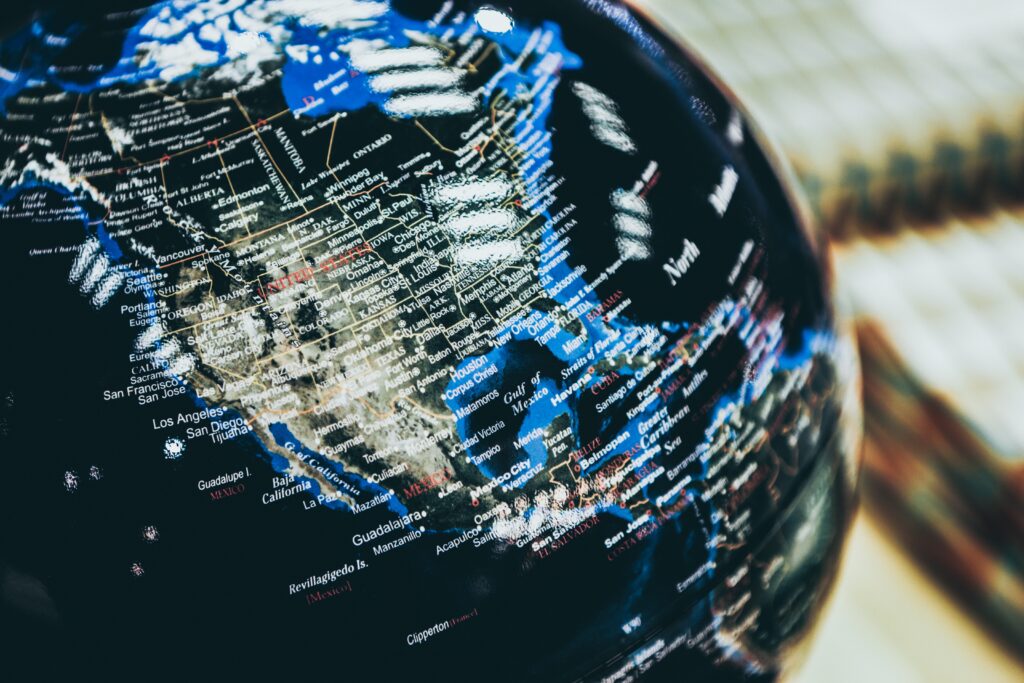 Close-up of a globe highlighting the United States, Canada, and Mexico, representing North American market analysis and expansion strategy.