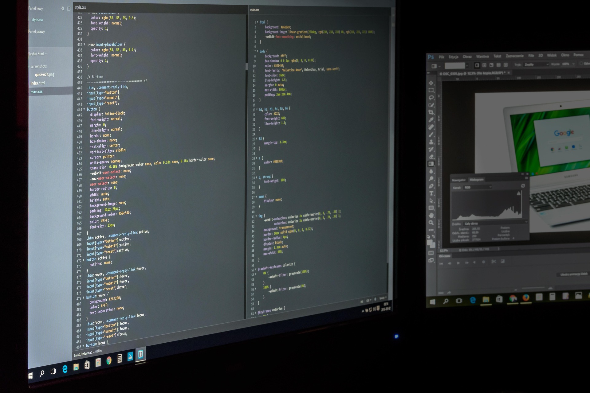 Two computer monitors displaying lines of code in a dark workspace, with a design program open on one screen.