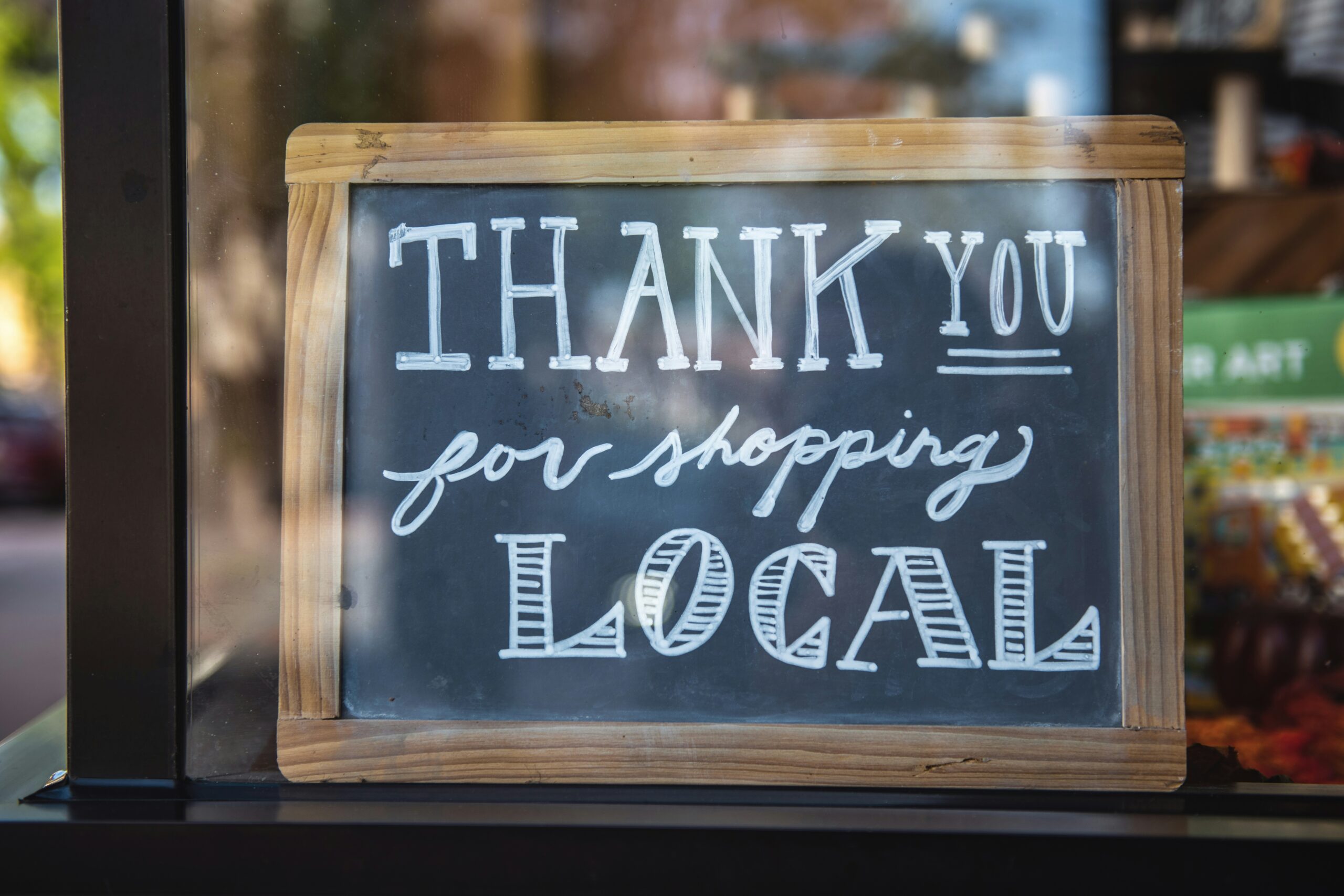 Small business sign reading "Thank you for shopping local"