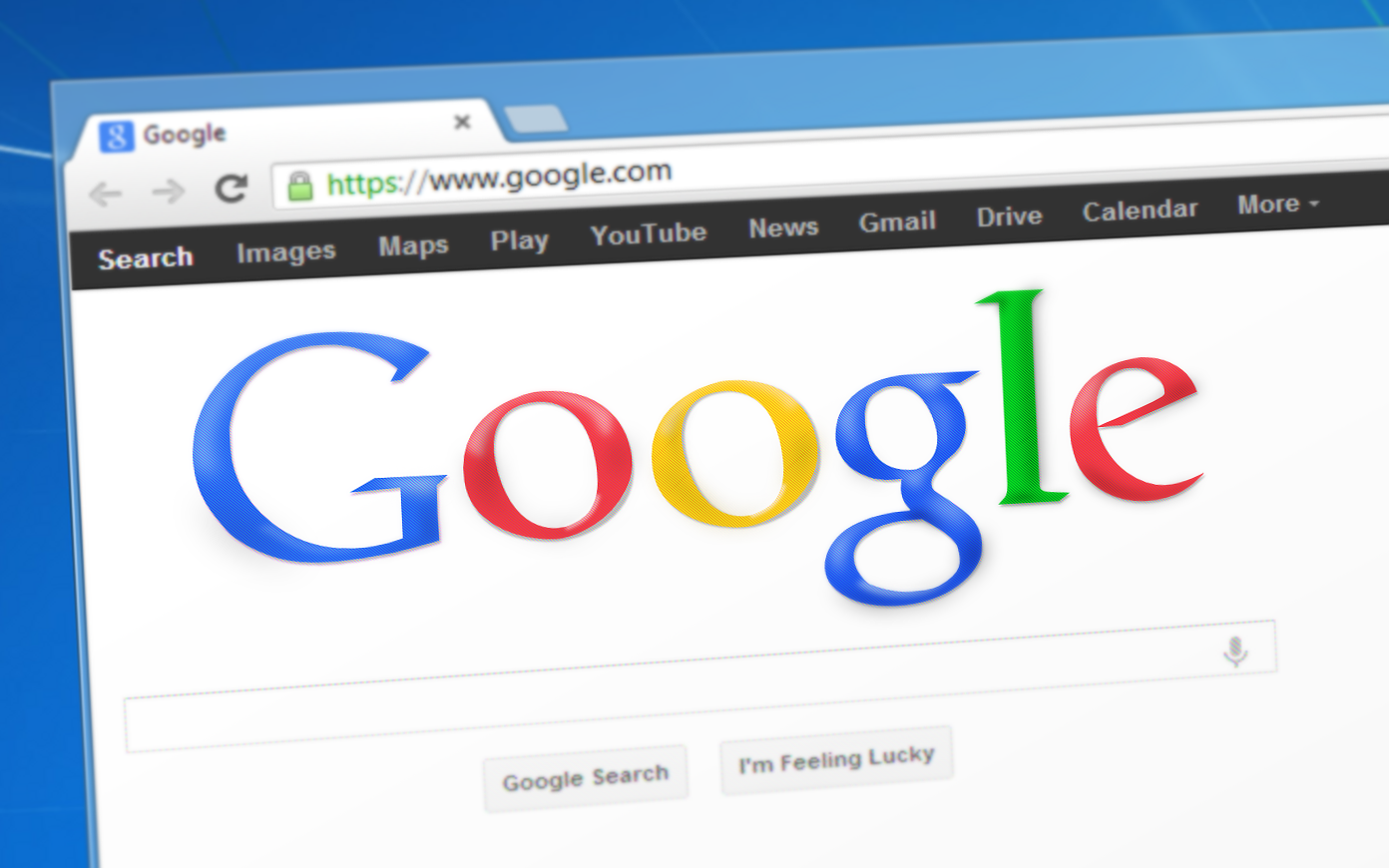 Google homepage displayed in a web browser, featuring the search bar and navigation links.