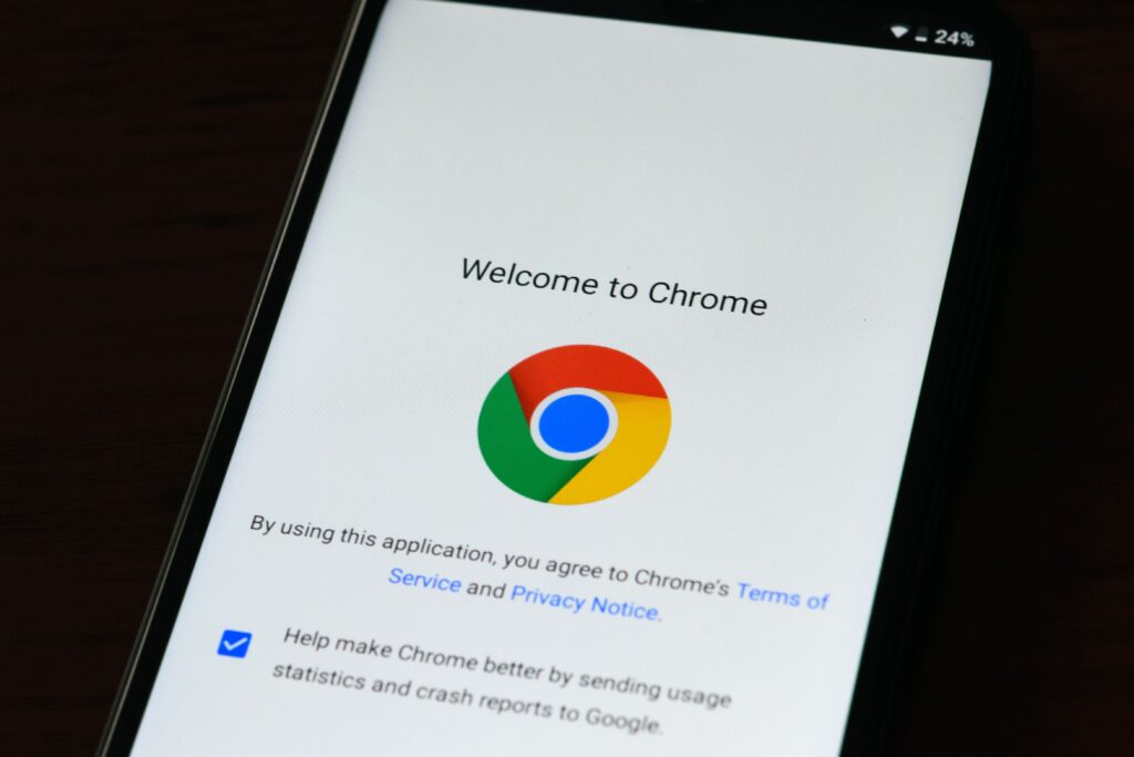 Smartphone displaying the Google Chrome welcome and setup screen.
