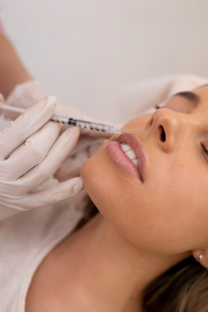 Woman getting an injectable in her lips