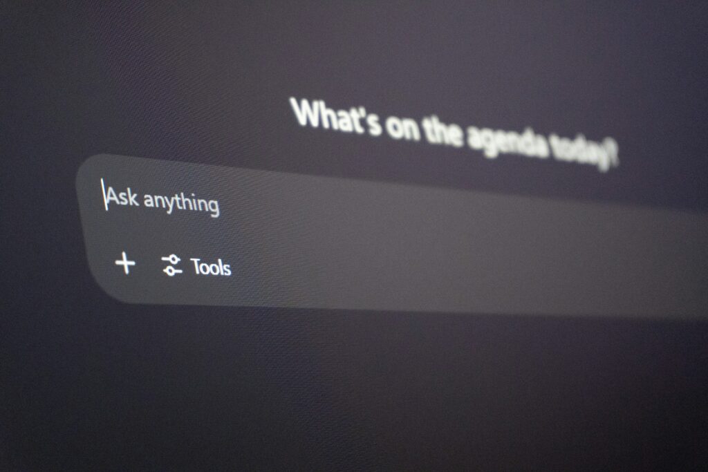 ChatGPT interface in dark mode showing the “Ask anything” prompt box with Tools and add options beneath it.
