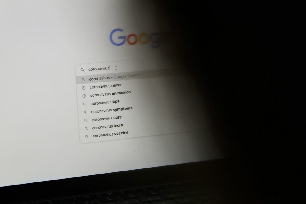 Black laptop displaying the Google search page
