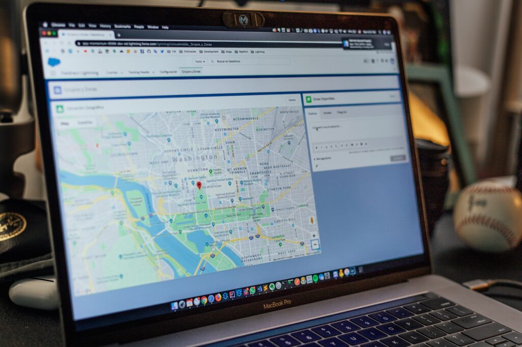 MacBook Pro showing a Google Maps search with a pinned location
