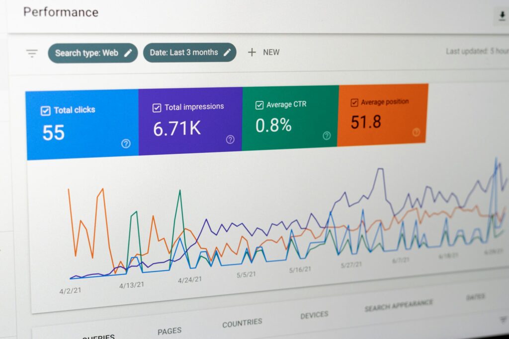Computer screen showing rows of performance data and metrics for tracking search results
